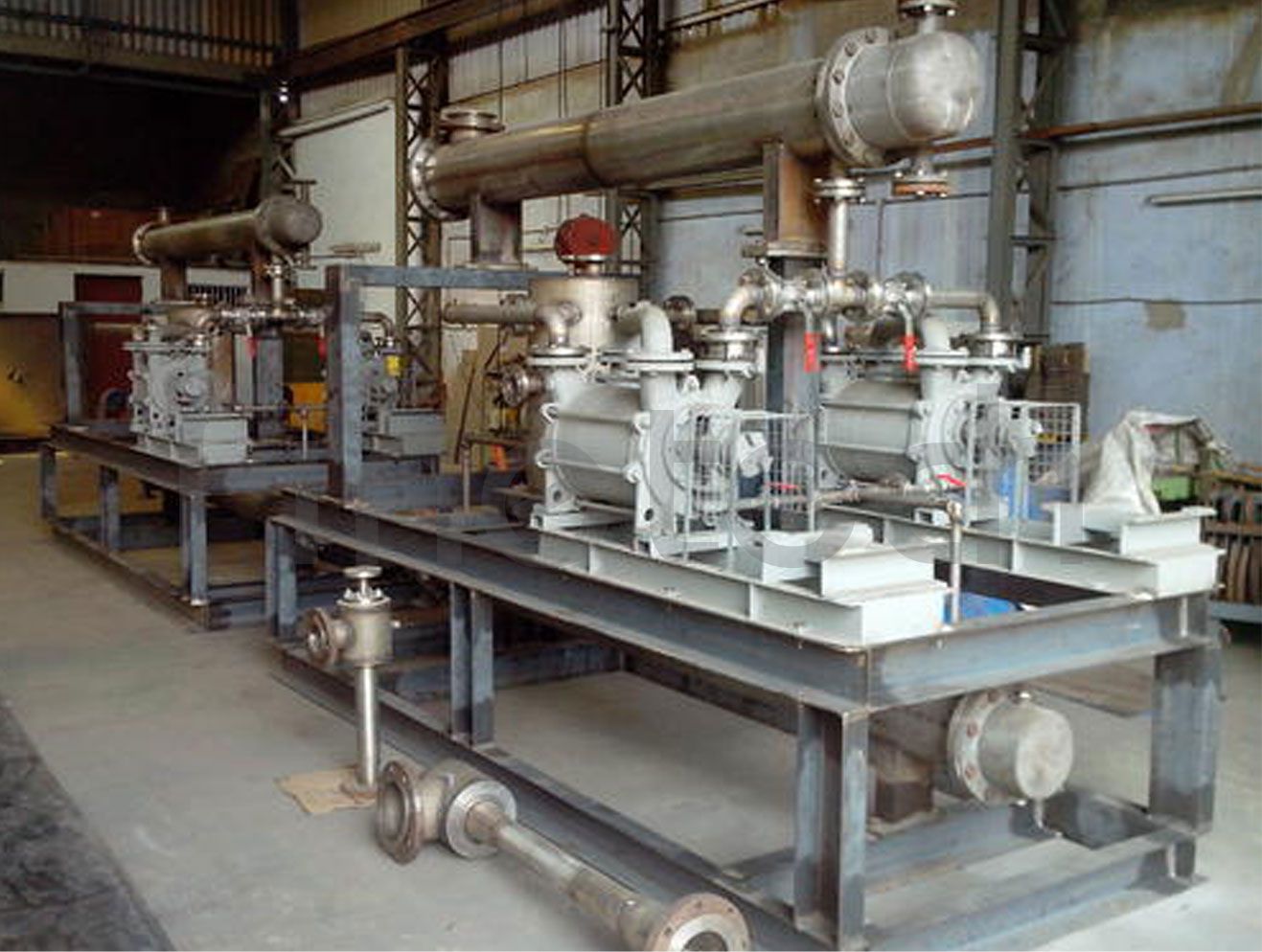 Steam jet ejector vacuum system